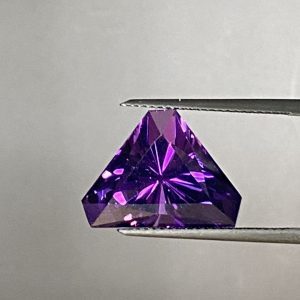 Triangular deep purple amethyst