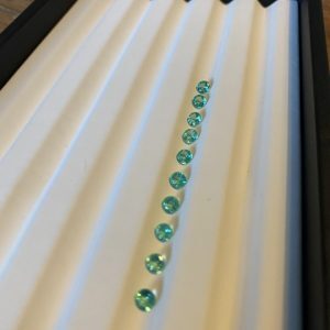Set of 10 round Colombian emeralds