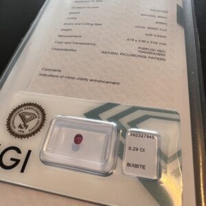 Oval red beryl with certificate