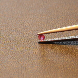 Set of round red beryls