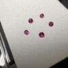 Set of round red beryls